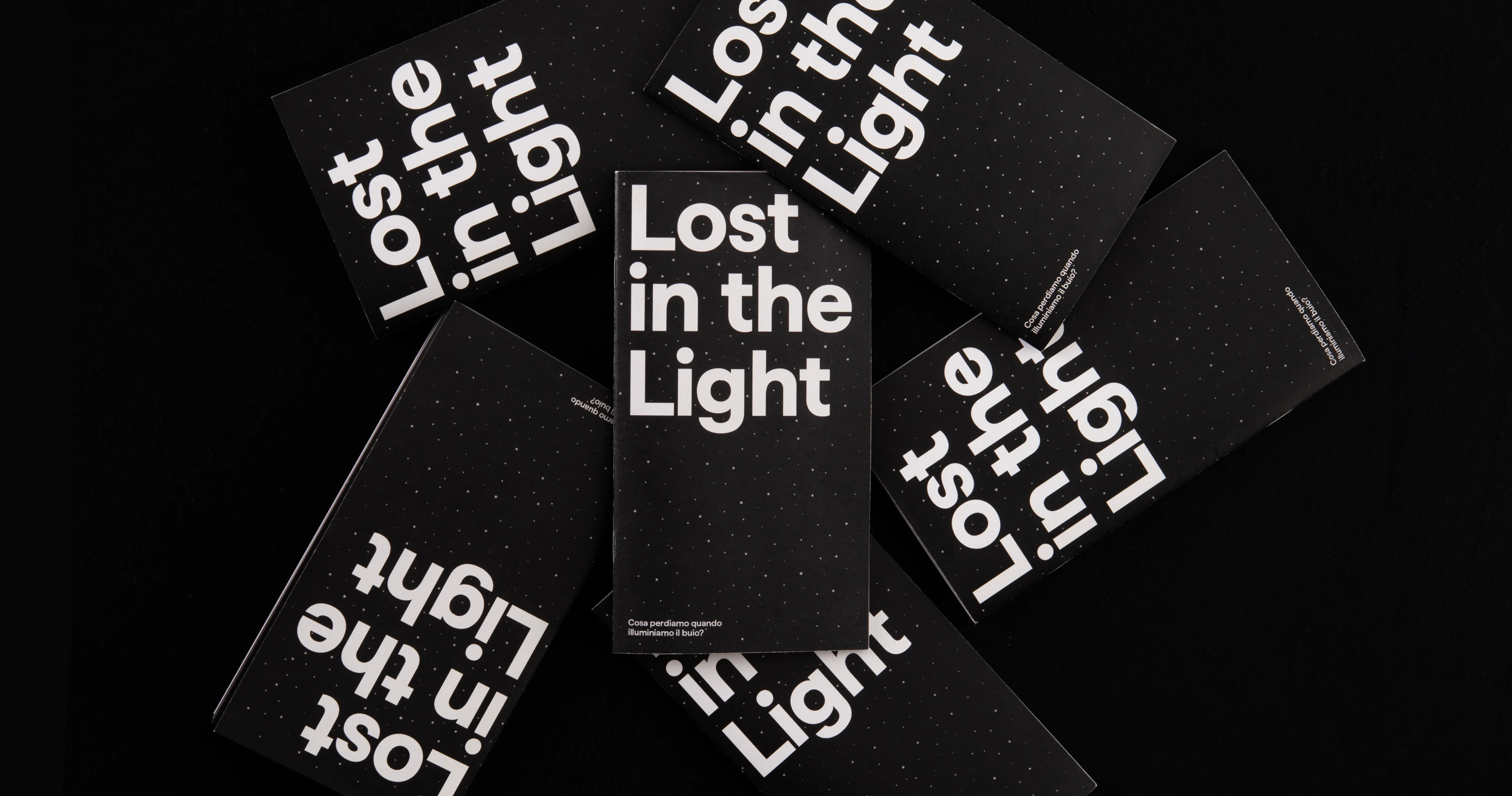 Black Lost in the Light publications with experimental white typography.